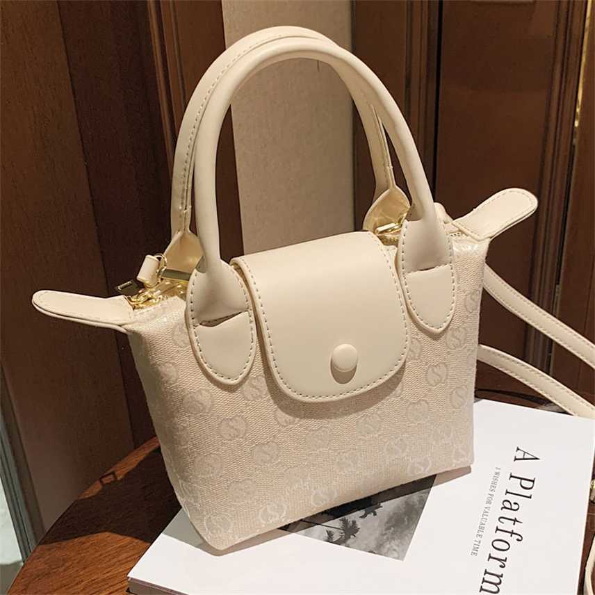 

Clearance Girls' popular small bag this women's summer new fashion Canvas Messenger Bag Pu splicing nylon handbag, White