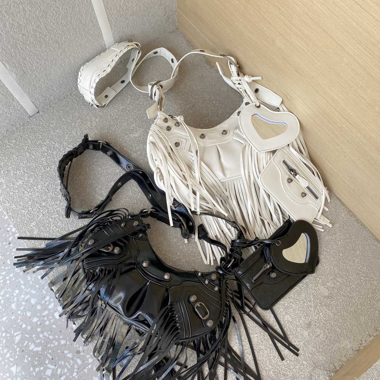 

AHer Max Design leather Balenicass biker bag Women's 2023 new style net red rivet tassel three in one motorcycle Spicy girl portable armpit shoulder messenger, Black1