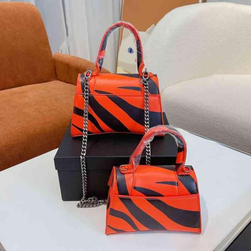 

2022 News Designer Bag Fashion Luxurys Bags Balencaig Vintage Trend Designer Hourglass Classic Italy 2022 Paris Orange Shoulder Handbags A18i