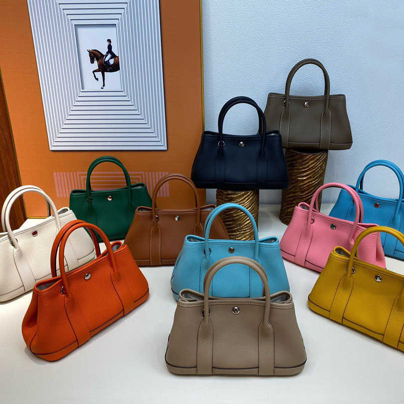 

h bag Fashion head H ermese leather bag Leather garden Togo high set manual bucket fashionable women hand versatile simple fashion, Sky blue
