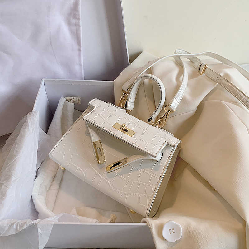 

Handheld Herme Designer Bags Ins Versatile Small women 2022 Summer Fashion One shoulder Portable Net Red Crossbody, Not for sale do not shoot