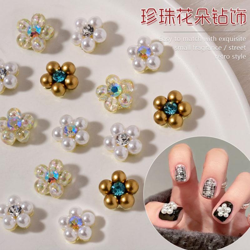

Nail Art Decorations 4PCS Alloy 3D Pearl Light Flat Bottom Magic White Flowers Resin Rhinestones Decoration Manicure Ornaments