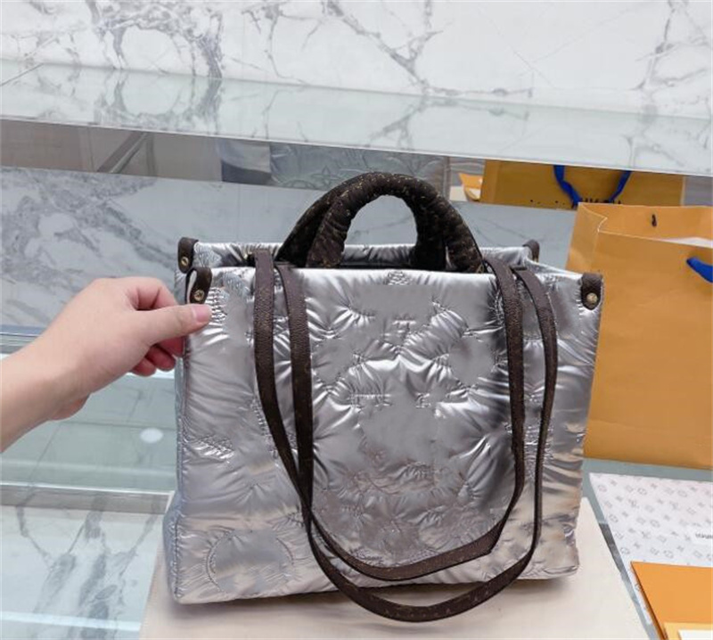 

Designer onthego Bags handbag winter Puffer Cotton tote women Shoulder crossbody bag Luxurys quilting Letter embroidery messenger wallet on the go Satchels M21069