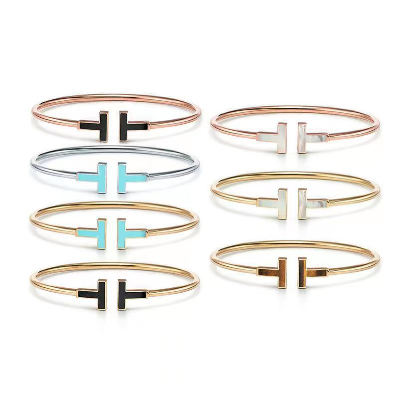 

Classic Brand Men Women Cuff Bracelet European Fashion Couple T Bracelet Luxury Designer Stainless Steel Jewelry Christmas Gift