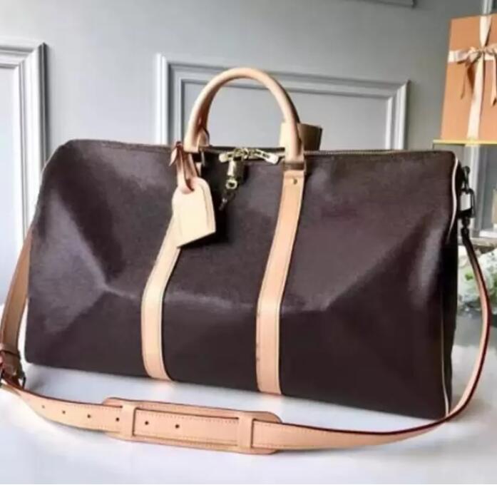 

2023 Designers Duffel Bags 45CM 50CM 55CM luxury large capacity travel sale High women men Genuine Leather shoulder Fashion bag carry rivets with lock head 013, Size 45 cm