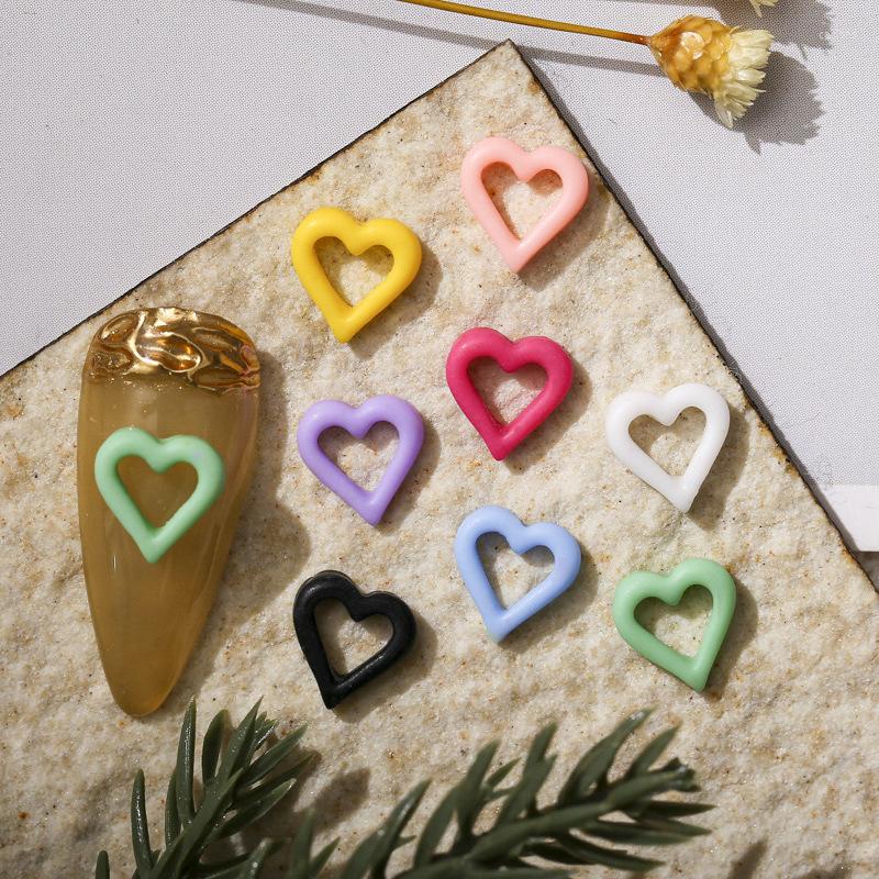 

Nail Art Decorations 100Pcs Resin Stickers Charms Hollow Heart Frame Design Rhinestones 8mm Accessories Manicure Gemstones