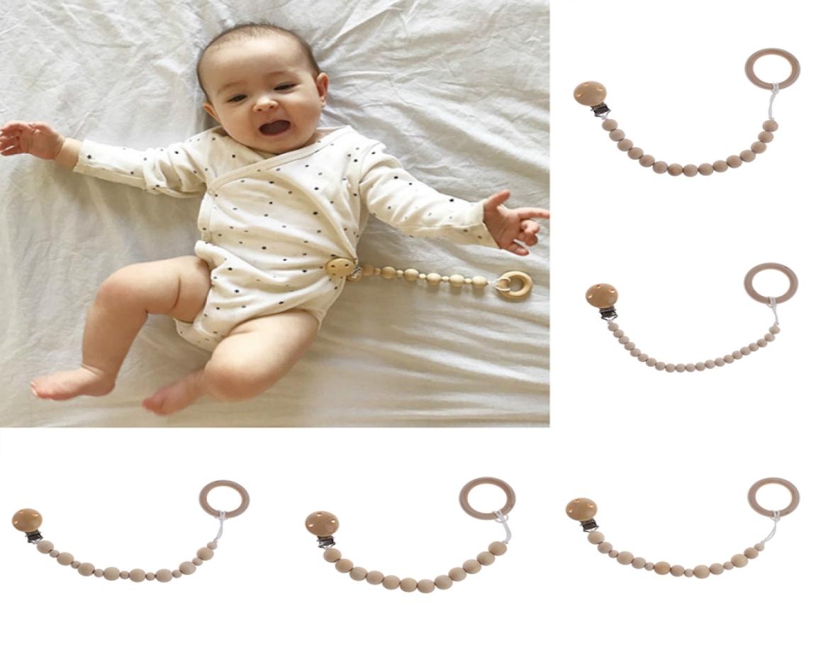 

2018 New Cute Baby Natural Wooden Beaded Pacifier Holder Clip Nursing Teether Dummy Chain Gift Baby Care5515086