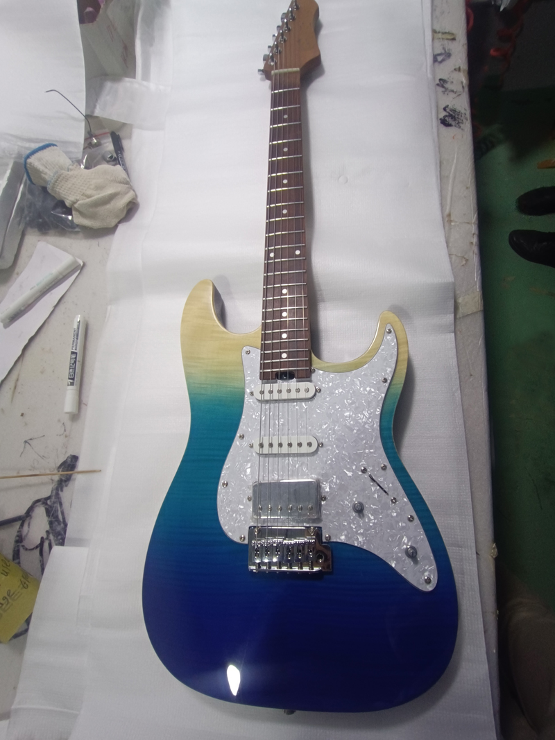 

Custom electric guitar carbon baked maple neck and fingerboard flame maple top