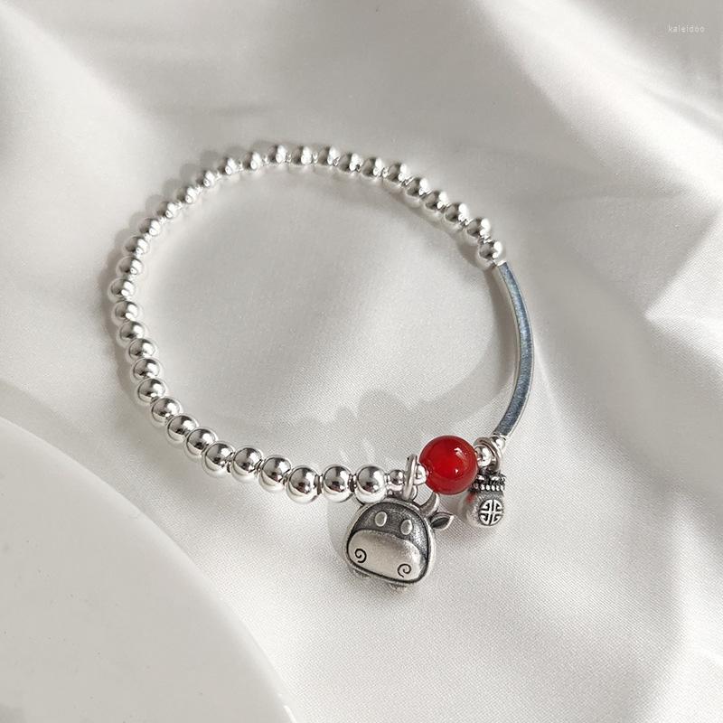 

Charm Bracelets Pure S925 Silvering Lucky Amulet Bracelet For Women Red Bead Zodiac Bull FU Pendant Elastic Rope Jewelry Gift Hand Chain