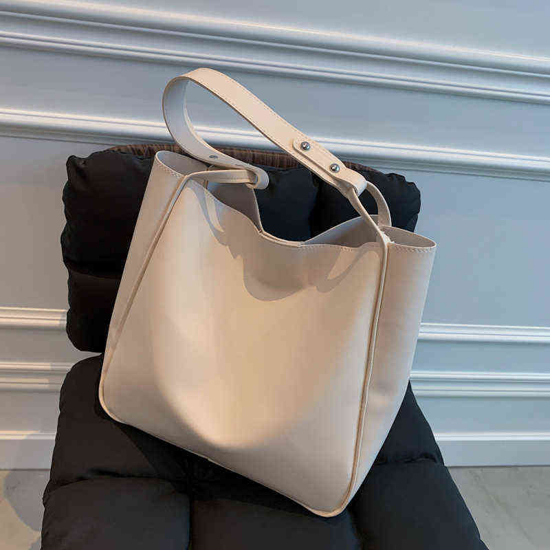 

Evening bag 2022 handbags Women's Korean version Slouchy style ins One shoulder practical shopping Simple text soft leather school bags lady Ms., Brown