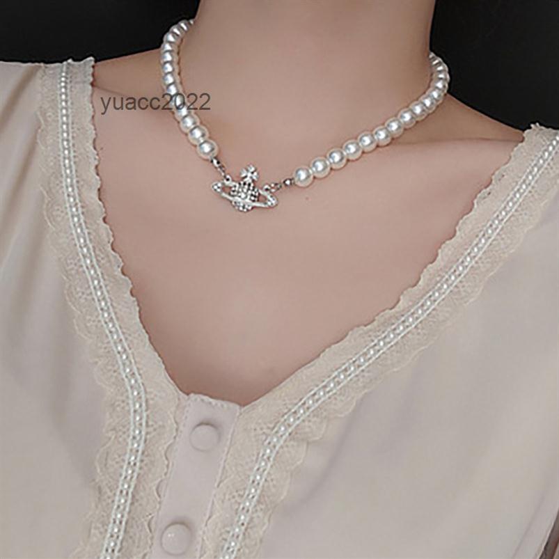 

Pendant Necklaces Vivian Westwood set with diamonds popular Star Pendant net red collarbone chain female simple ins style Saturn Pearl 277m