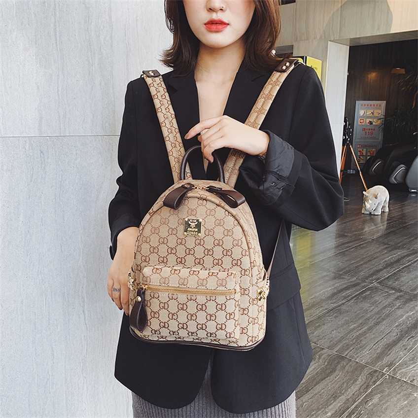 

Wind letter old flower fashion canvas rivet new backpack style slung Bag Fashion Purses Sale, Trumpet