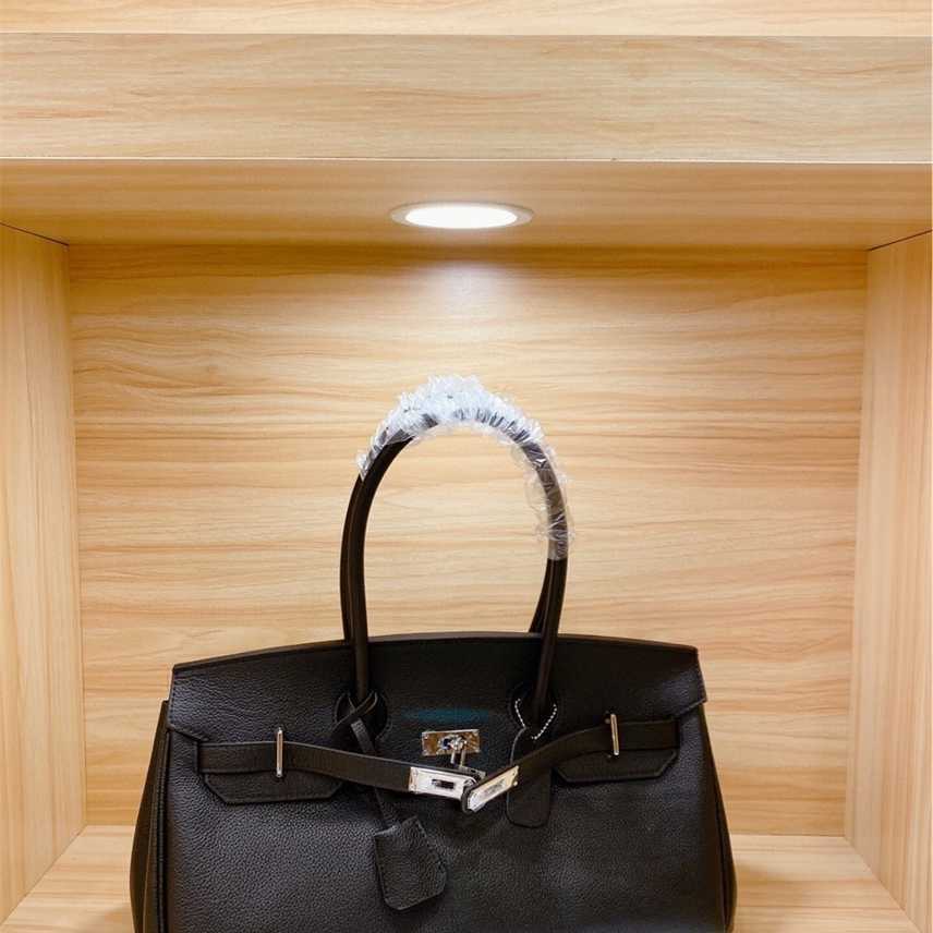 

Clearance three dimensional bag horizontal style square soft handle trend solid color lock slant span black middle, 40cm