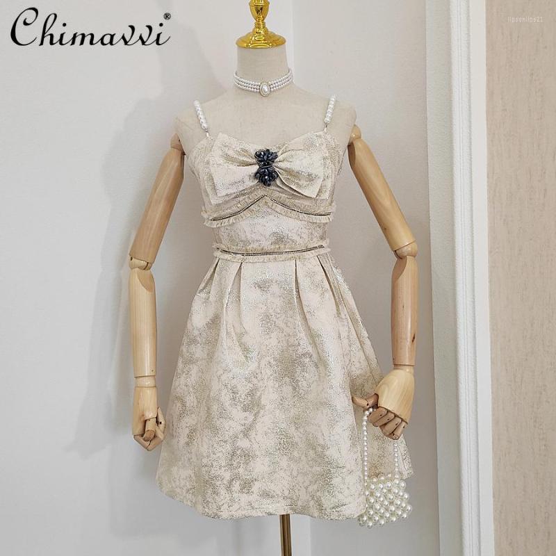 

Casual Dresses Diamond Tassel Pearl Shoulder Strap A-line Suspender Dress Female 2022 Spring Bow Backless Short Waist For Women, Apricot