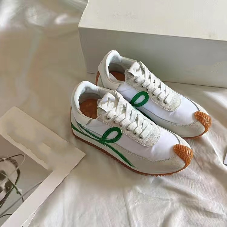 

Mens Womens Loews Luxury Casual Shoes Flow Runner in nylon suede Lace up sneaker soft upper honey rubber wave sole that curves around the toe and heel L monograms side 02