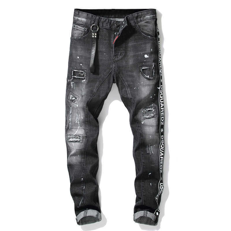 

Autumn and winter new tattered paint splicing men's slim Stretch Jeans Black tight beggars pants 1011