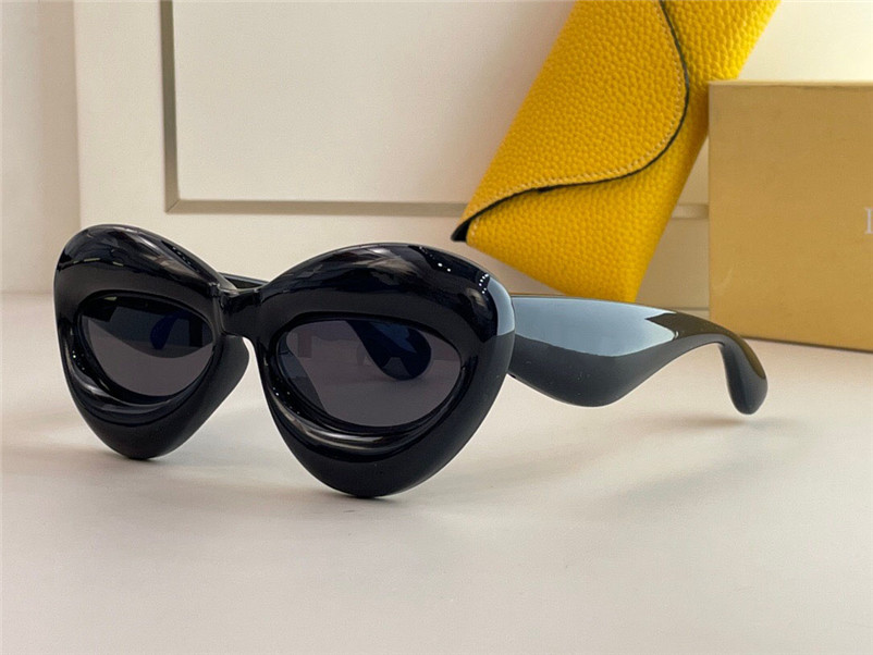 

New fashion sunglasses 40097 special design color lips shape frame avant-garde style crazy interesting with case high end quality glasses