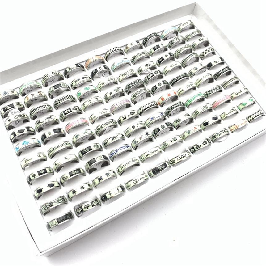 

Whole 100pcs Lot Band Rings Stainless Steel Luminous Fashion Jewelry For Men Women Sticker Glow in the Dark Party Gift Mix Patterns298j