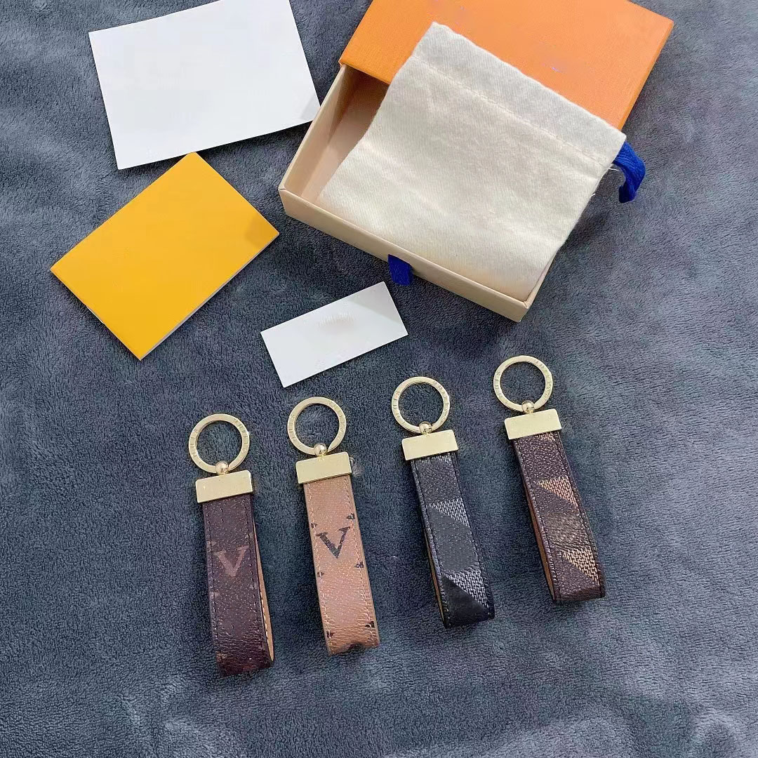 

Leather key chain designer keychains mens keychain cute gift men women car bag pendant accessories quality with box black fashion alloy lovers KEY ring wholesale