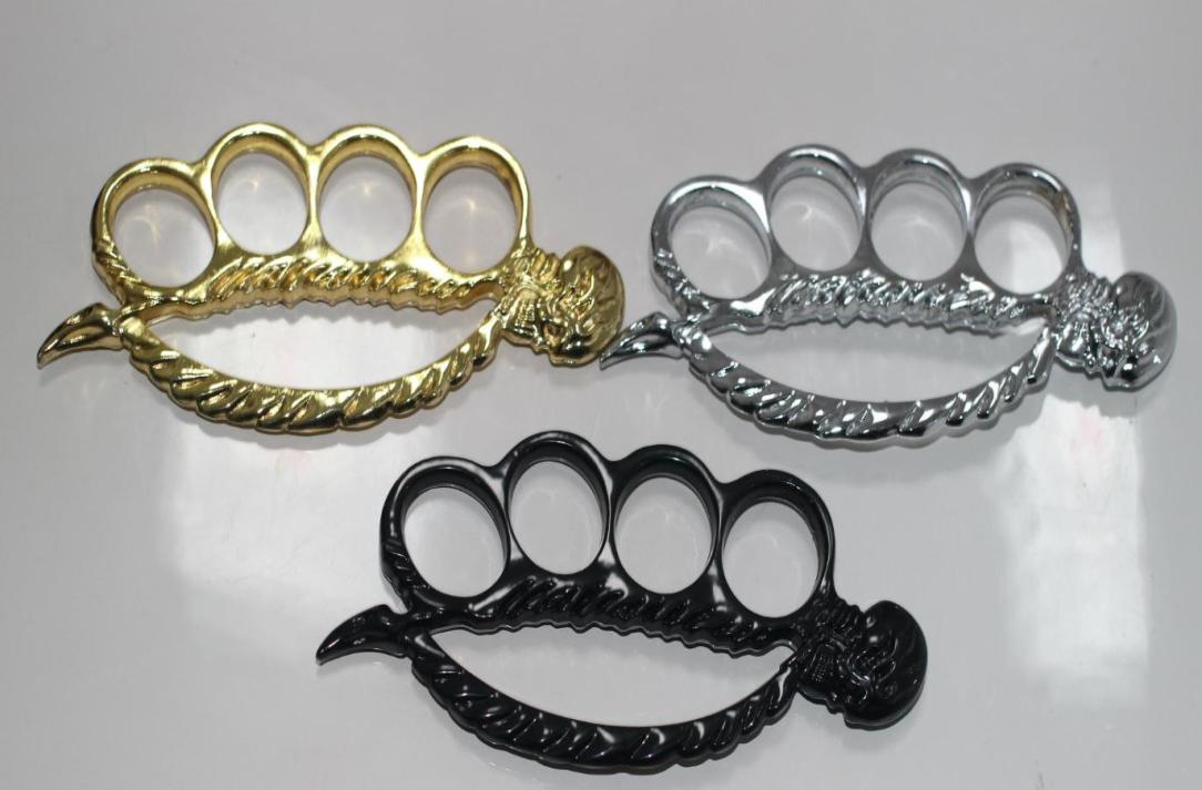 

New knuckles duster Iron four finger buckle Big ghost head fist buckle outdoor tactics selfdefense tool9877799