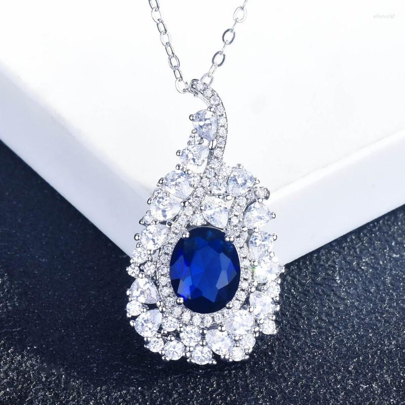 

Chains Elegant Sapphire Blue Color Pendant Necklace For Women White Cubic Zircon Oval Gem Wedding Party Dress Jwewlry