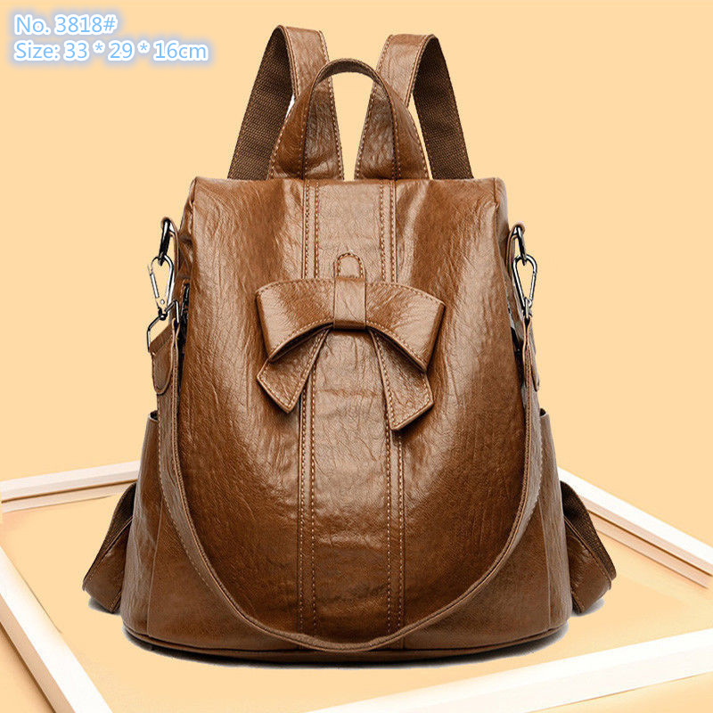 

Wholesale factory ladies shoulder bag 2 color street fashion anti-theft backpack simple Joker solid color leather handbag cute bow college style women backpacks, Brown-3818#