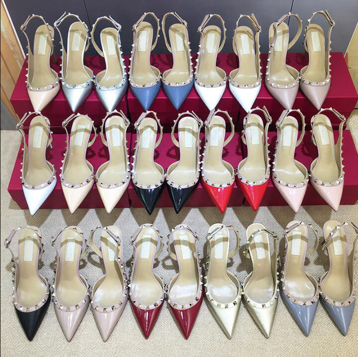 

Luxurys Women's Sandals Pointed Toe High Heels Strap Rivets Patent Leather Studs Sandal Women Brand Dress Shoes Black White Nude Summer Big Size 35-44