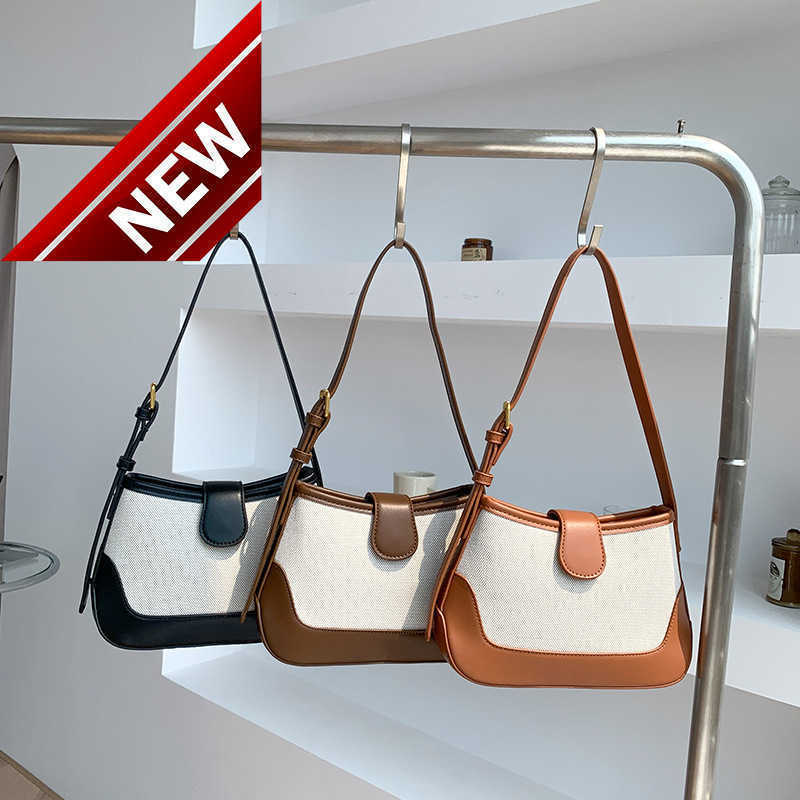 

Women's Designer BagsAutumn Hand Small Crowd Arc De Triomphe Armpit Sense Shoulder Ins Women's Fashion Splicing Canvas Factory Direct Sales, Brown 1