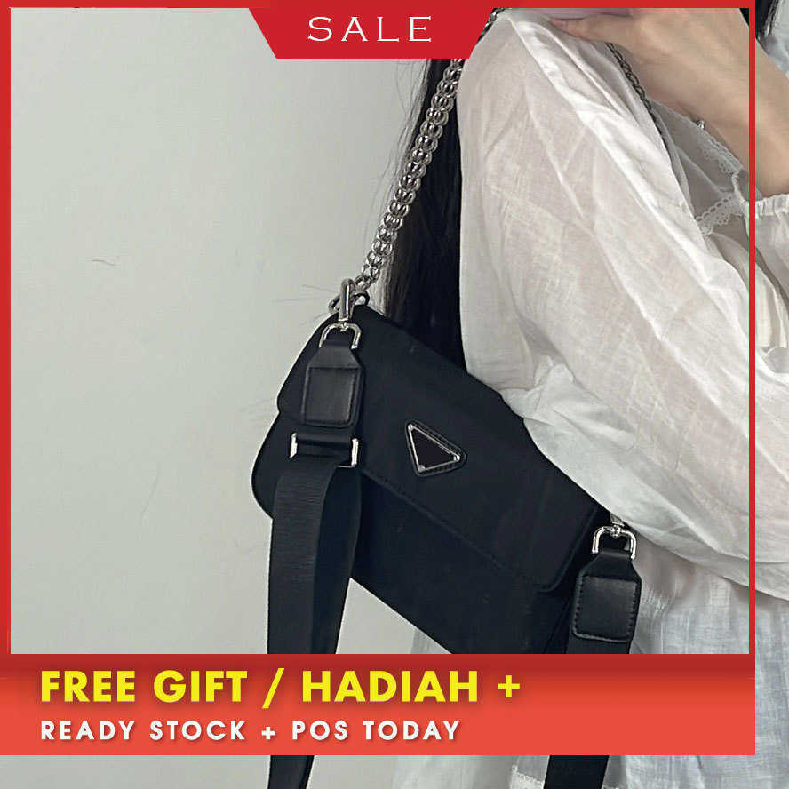 60% de réduction sur les sacs de créateurs de luxe p Family Women 2022 New Triangle Chain Tissu Oxford imperméable avec épaule errante en cuir Ms