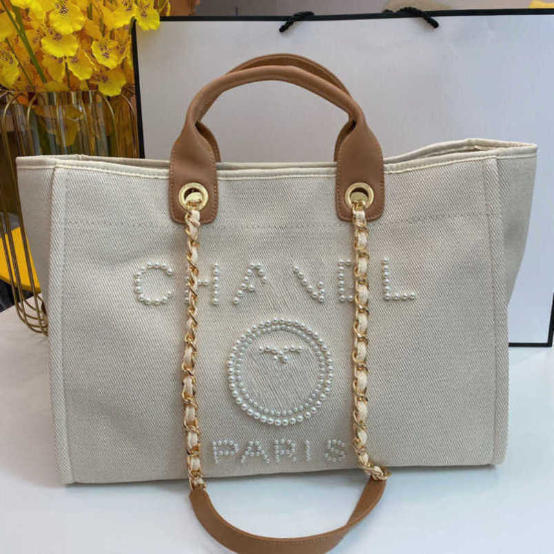 

Fashion Women's Luxury Evening Bags Ch Brand Canvas Handbag Classic Pearl Beach Hand Bag Designer Female Large Backpack Small Packs Portable Shopping Handbags U7pz, Beige