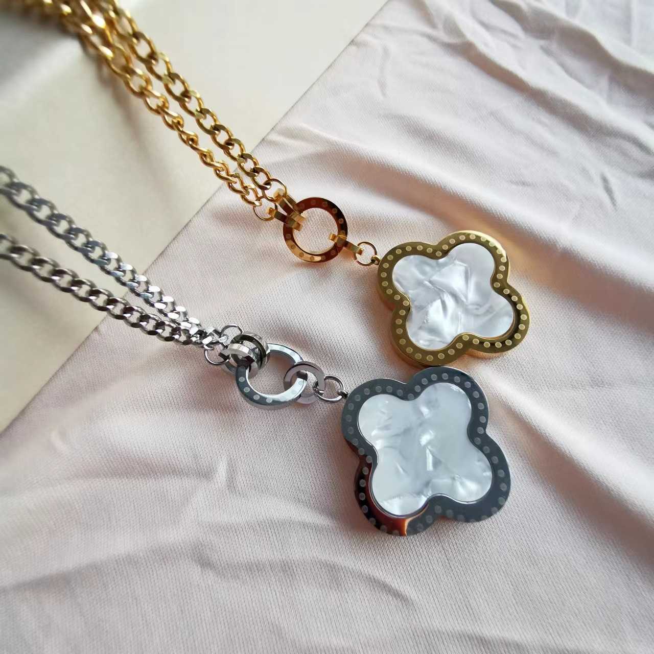 

Pendant Necklaces New to the market in 2022 personalized full-size titanium steel double-sided four leaf clover color fast sweater chain