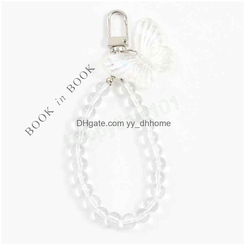 

Key Rings Crystal Butterfly Keychain Transparent Bead Lanyards Key Ring For Bling Hand Wrist Strap Rope Cord Holder Drop Delivery Jew Dhiyq