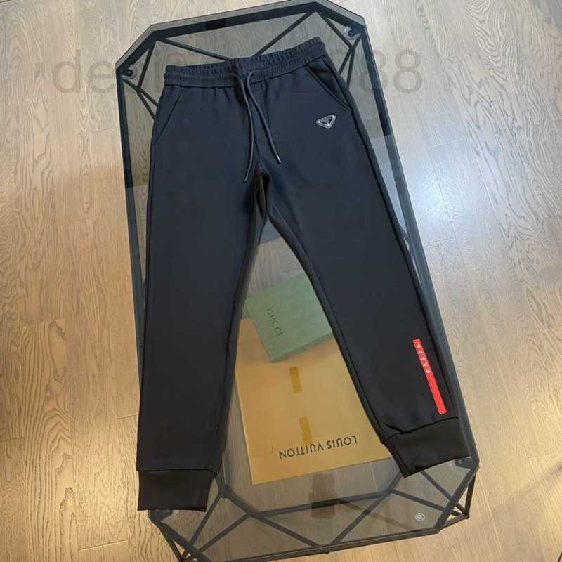 

Women's Pants & Capris designer Couple Classic Triangle Letter Pressure Glue Splice Casual Men's JNKU, Black