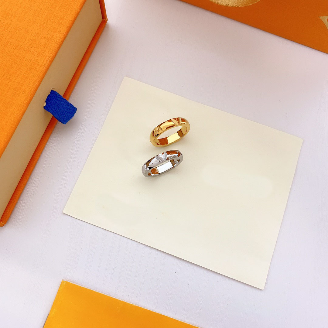 

Luxury Designer Band Rings Women Men Stainless Steel Letter Titanium Steel Ring 18K Gold Plated Metal Wedding Jewelry Lady Accessories Size 6/7/8/9/10