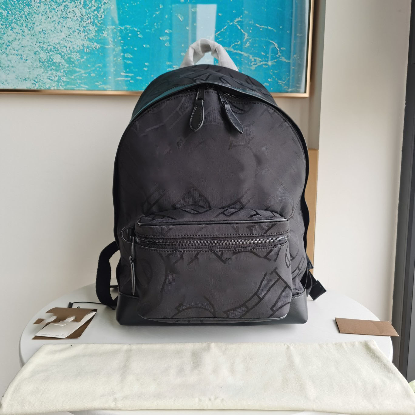 

The famous fashion brand's exclusive logo jacquard backpack leather nylon men's travel backpack