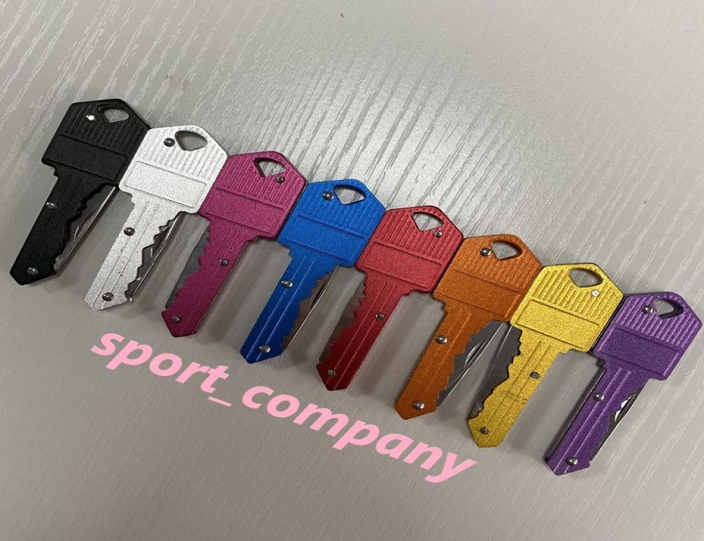 

8 Colors Mini Folding Knife Outdoor Gadgets Key Shape Pocket Fruit Knife Multifunctional Keychain Knife Saber Swiss Selfdefense K1668728