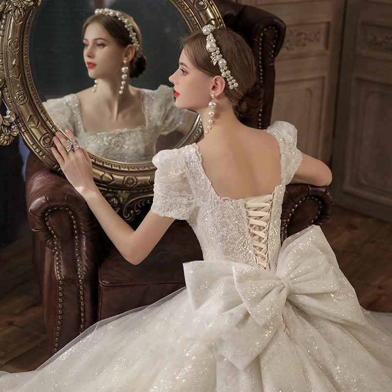 2023 luxe cristal perles robe de mariée longue dentelle encolure dégagée une ligne robes de mariée avec arc balayage train robes sur mesure