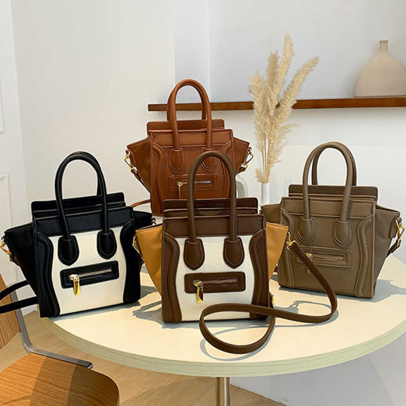 

2022 South Korea Tote Bags Lizhi Pattern Smile Face Bag Designer shoulder bag Multi functional Women's Handbag Embarrassment Bat Wing Cross Body, Black