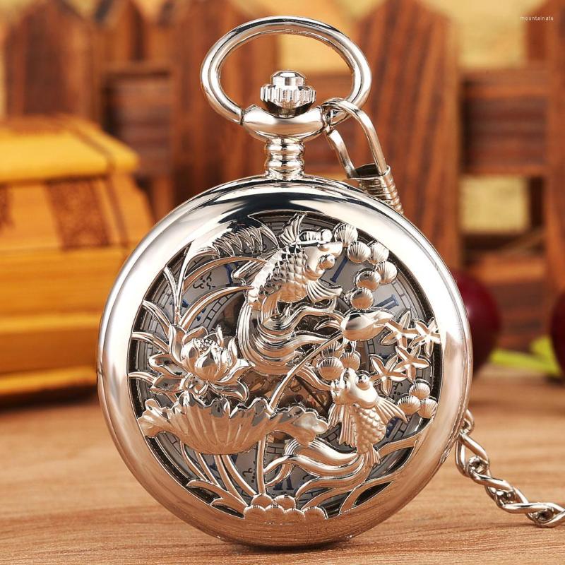 

Pocket Watches Silver Hollow Two Fish Design Manual Mechanical Watch Romen Blue Numerals Face Pendant Necklace Clock Men Women
