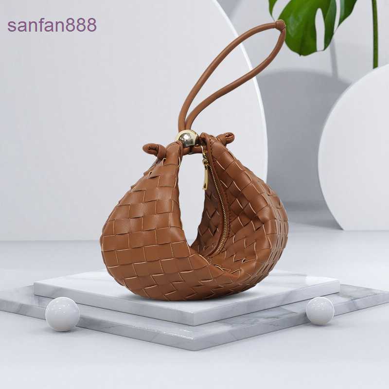 Bottegas Bag Venetas Jodie 2023 New Turn Golden Ball Woven Women's Foreign Style Little Handbag Leather armpit cloud dumpling bag TJXE