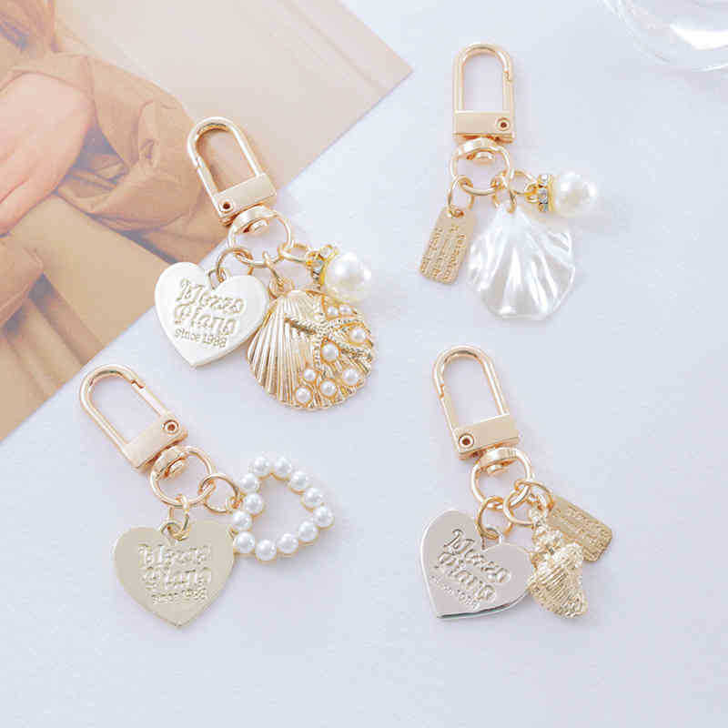 

Keychains Metal key chain lovely shell pendant ins bag creative gift