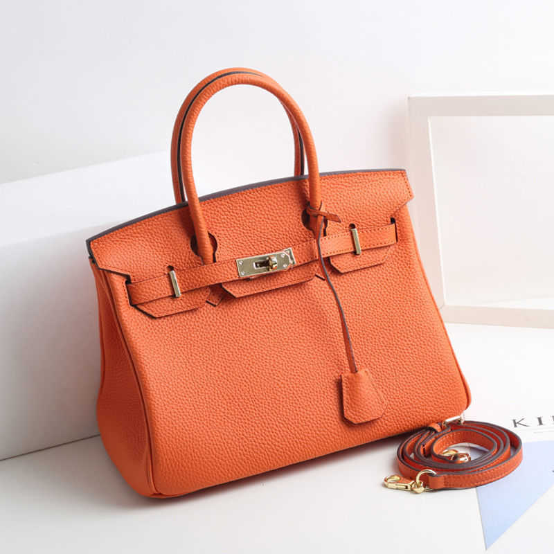

Fashion birkins woman herme bag New large capacity leather women s top layer cow Single Shoulder Messenger Fashion versatile hand, Orange