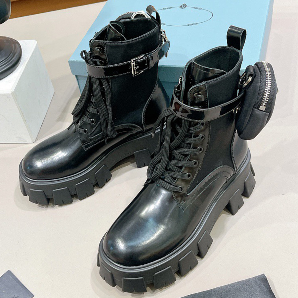 

Monolith brushed leather and nylon boots These boots have multifunctional bags which are reminiscent of the formal design multi pocket uniforms inspired this shoes, Shipping supplement