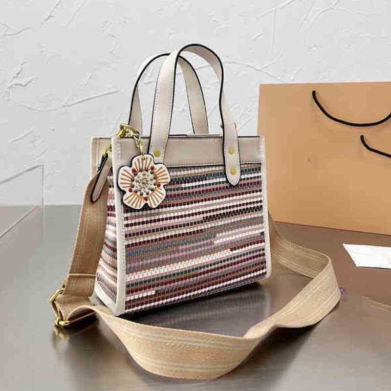 

Totes Tote Bag Designer Handbags Women Shopping Bags Handbag Shoulder Braided Leather Crossbody Female Travel Bucket Flower Pendant 2201010, Multi-color