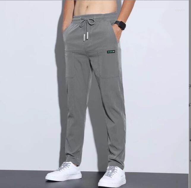 

Men's Pants Ice Silk Casual Men's Summer Thin Section 2022 Trend Straight Four-sided Elastic Light Business Trousers