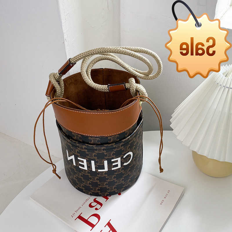 Designer bags Arc De Triomphe Hemp Rope Bucket Old Flower Cylinder Large Capacity Versatile Fashion Pig Nose One Shoulder Armpit Bag Factory Direct