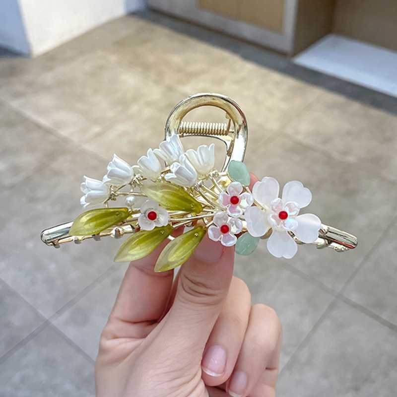 

Chinese wind chime orchid pearl large clip fashionable and elegant in summer shark clip back head