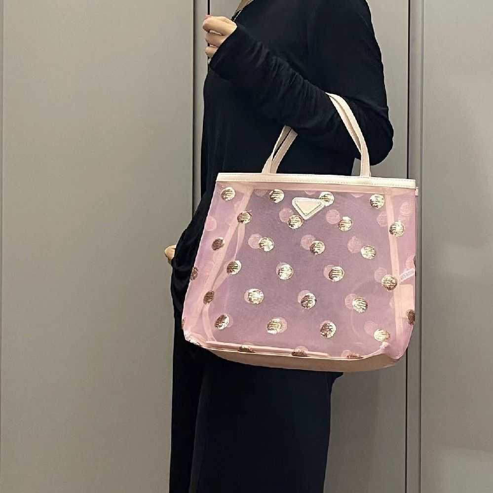 

designer pra bags The new p mesh wave lighting film is decorated the tote bag triangle badge hand-held armpit lower mother and women's vegetable handbag, Black