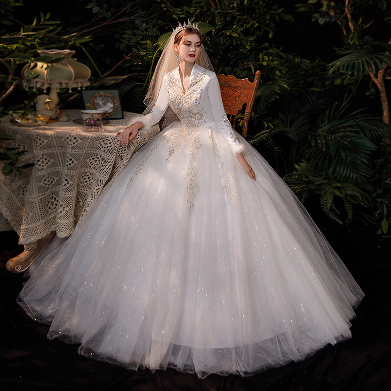 Dubai ball gown Wedding Dresses Elegant Long Sleeves Sheer Crew Neck Lace Appliques Beaded Vestios De Novia Luxury Bridal Gowns with Buttons