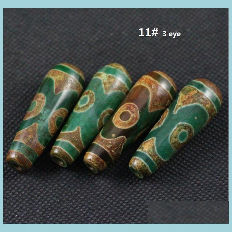 

Stone Stone 15X40 Tibetan 2 Eyes 9 Dzi Natural Agate Stones Beaded Antique Old Loose Beads For Diy Necklace Pendants Drop Delivery 2 Dh2Kv